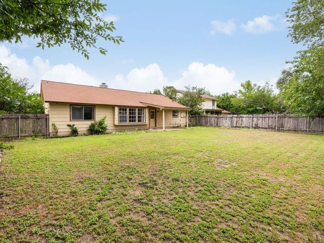 Fenced backyard featuring a patio area | Image 22