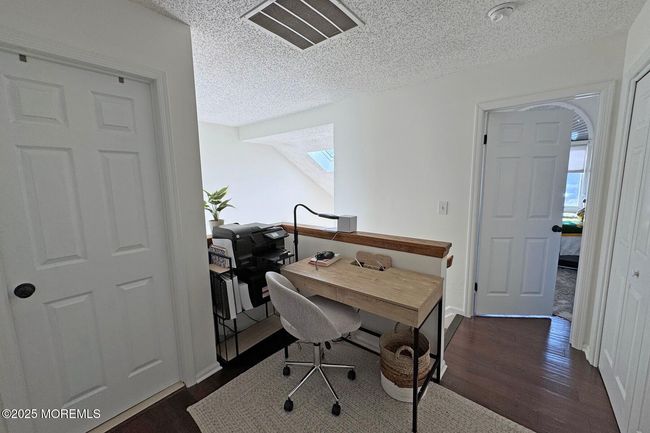 Spacious upper landing allows plenty of space for a home office nook | Image 20