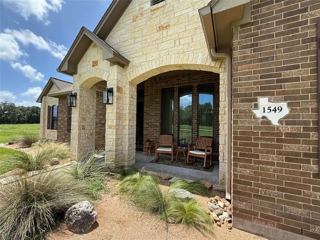 The perfect front porch to enjoy watching the local wildlife. | Image 22