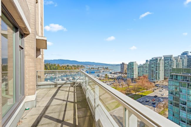 Balcony featuring a city view and a water and mountain view | Image 5