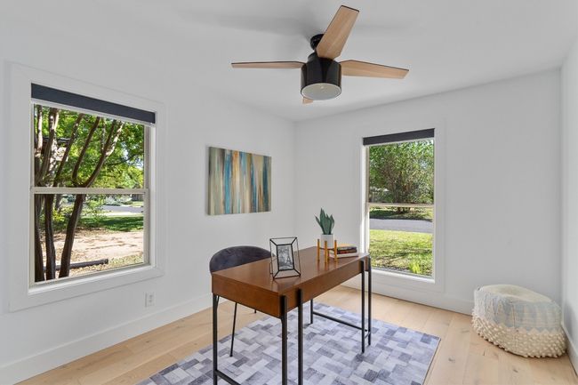 Two additional bedrooms offer flexibility for guests, a home office, or gym. | Image 16