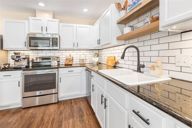 Subway tile backsplash and stainless steel appliances | Image 5