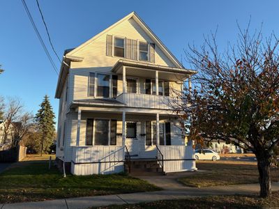 This attractive 2 family home is centrally located in desirable Wallingford. | Image 1