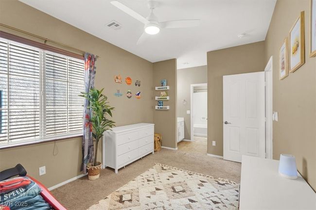 Carpeted bedroom featuring baseboards and ceiling fan | Image 15