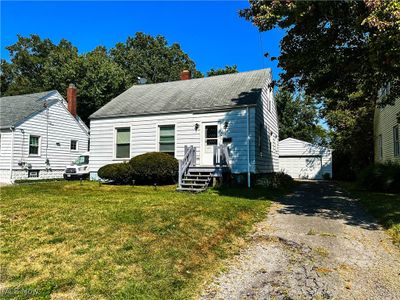 View of front of home with a front lawn | Image 1