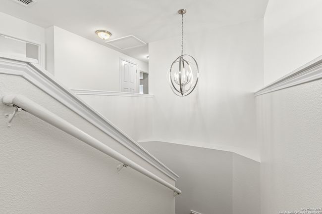 Stairs landing with modern chandelier | Image 18