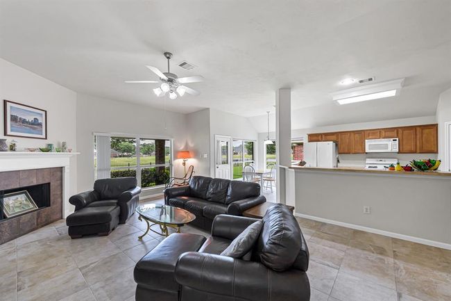 Spectacular open floor plan that connects the living room to the kitchen and breakfast area! | Image 5