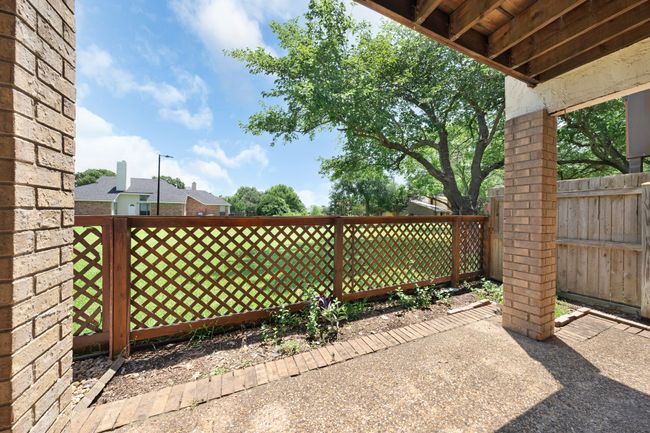 This is just part of the huge back patio and easy care yard space. Gate opens to beautiful greenbelt and leads to community pool and center across the green space. | Image 21