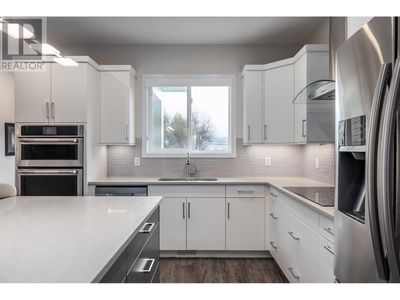 873 Dehart Rd, House other with 4 bedrooms, 3 bathrooms and 10 parking in Kelowna BC | Image 3