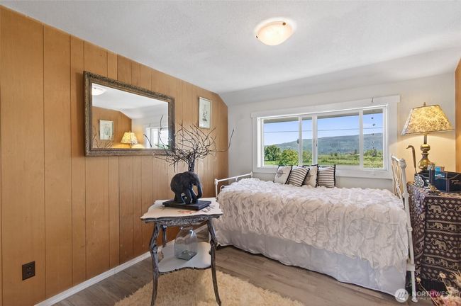 Upper bedroom also. All upper bedrooms have great views of either river or territorial pastures and mountains. | Image 29