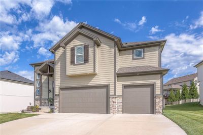 THE KITCHEN AND DINING AREA ARE NEXT TO EACH OTHER. YOU CAN ACCESS THE COVERED PATIO FROM THE DINING AREA AND YOU CAN ACCESS THE MUDROOM, PANTRY, GARAGE, BATHROOM, AND OFFICE FROM THE KITCHEN. | Image 3