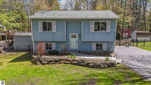 10587 Wildwood Rd, Interlochen, MI, 49643-9116 | Card Image