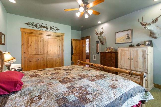 Carpeted bedroom with recessed lighting and ceiling fan | Image 21
