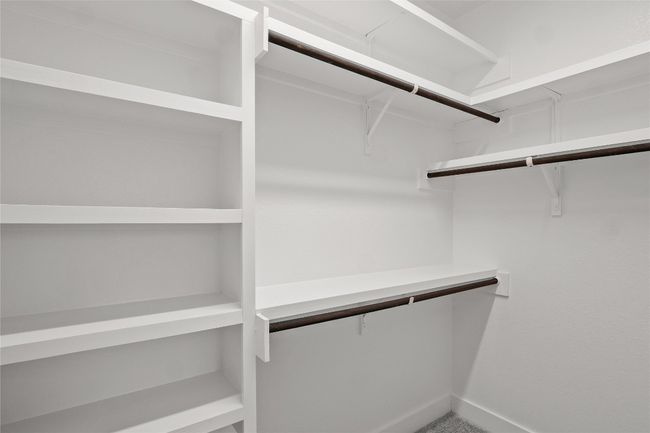 View of walk in closet | Image 23