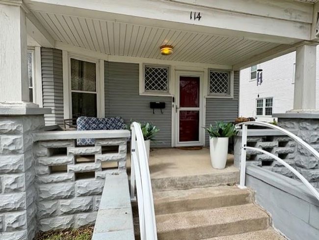 View of exterior entry featuring covered porch | Image 5