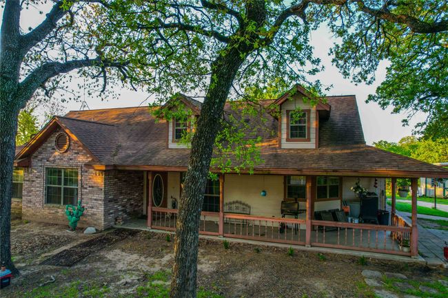Rear view of property with a shingled roof | Image 4