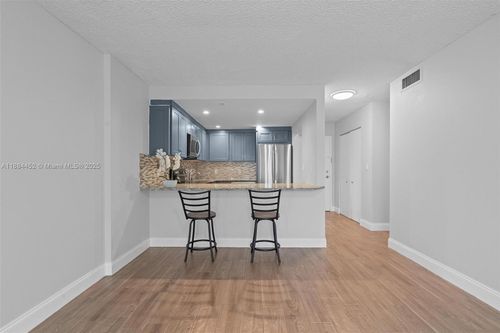 a107-16851 Ne 23rd Ave, North Miami Beach, FL, 33160-3778 | Card Image