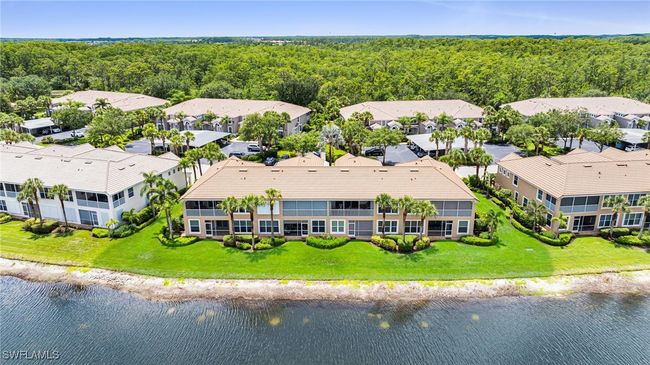 Aerial of end unit with lake | Image 23