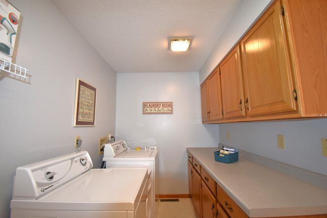 Upper Level Half Bathroom/ Laundry Room | Image 24
