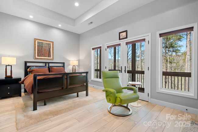 Second Primary Suite with Primary Suite with Tray Ceilings, French Doors to screened porch and spa bathroom | Image 18