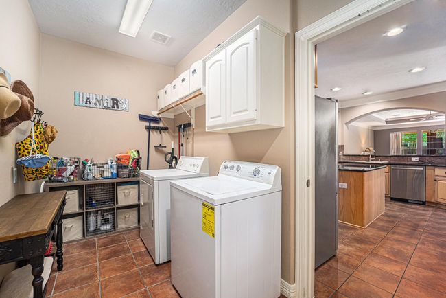 Big laundry room with storage space. | Image 16