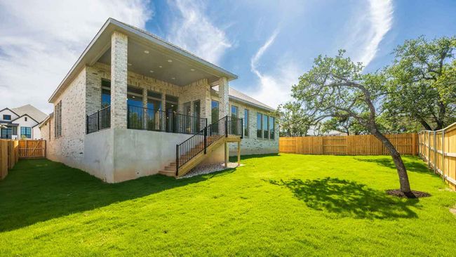Rear view of property featuring stairs and brick siding | Image 12