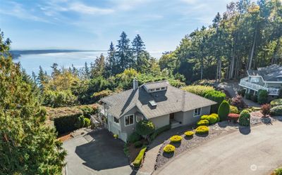 Timeless home perched atop Emerald Shores | Image 1