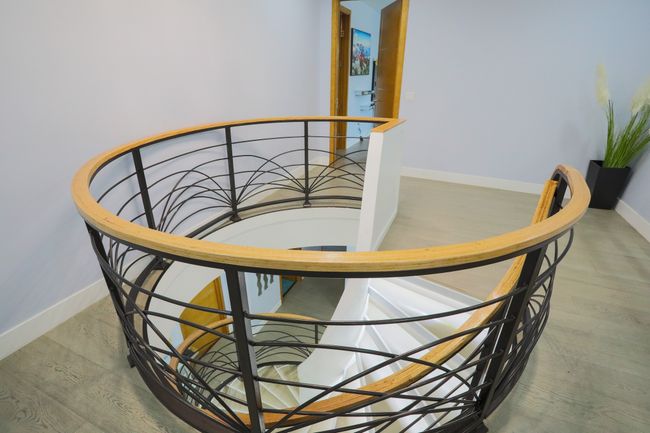 Stairway with hardwood / wood-style floors | Image 19