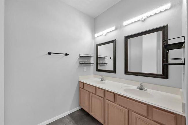 The updated mirrors, sleek lighting, and practical yet decorative storage will make your daily routine comfortable and enjoyable. | Image 20