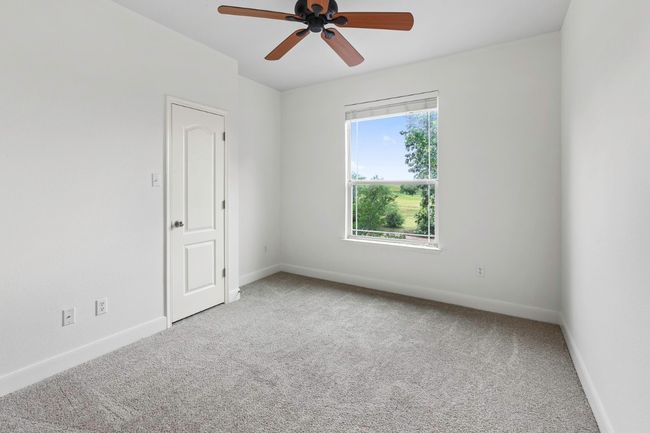 Spare room featuring carpet floors | Image 19