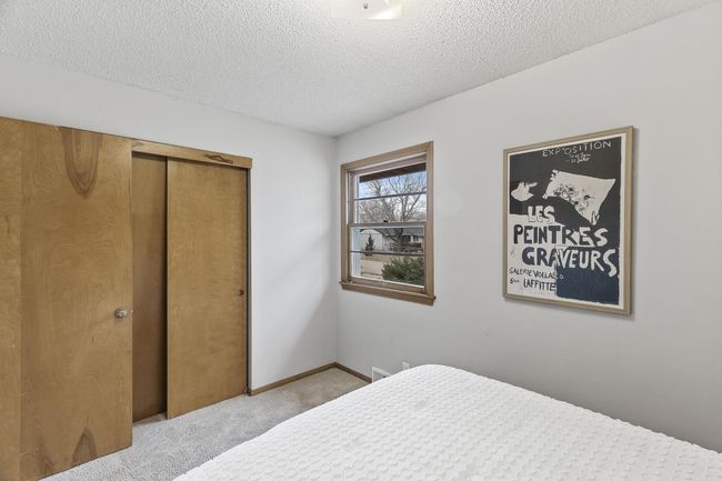 View of the front-yard facing window and closet space. | Image 22