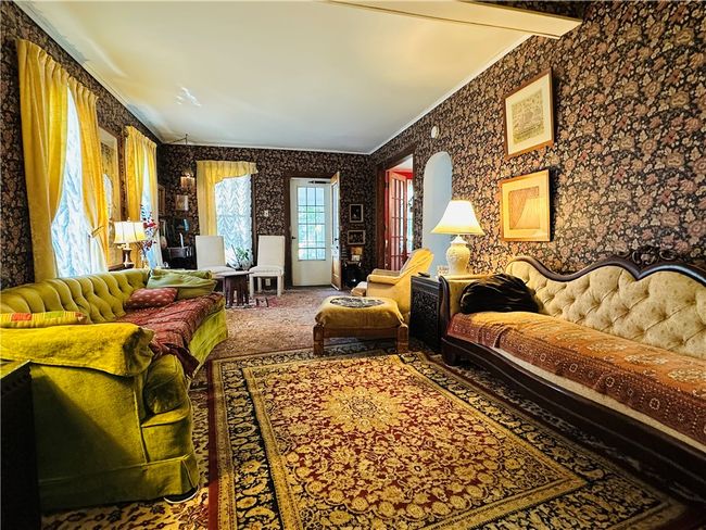 Unit 1 - Living Room - looking towards the front door. | Image 5