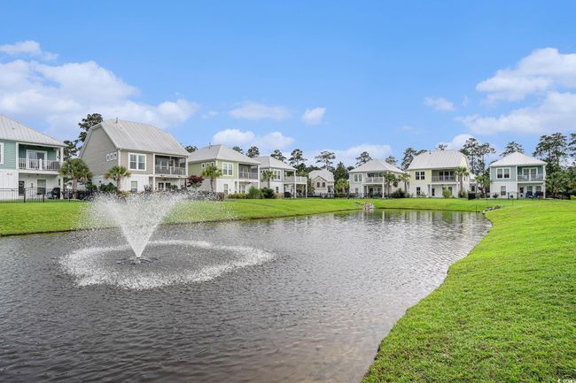 Water view with nearby suburban area | Image 31