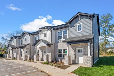 The front porch is covered & has loads of curb appeal. | Image 2