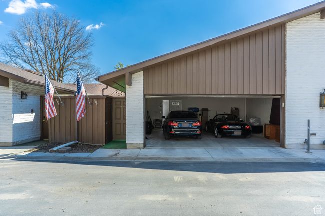 Exterior space with a garage and board and batten siding | Image 30