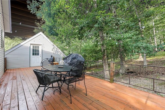 Wooden deck with outdoor dining space | Image 44