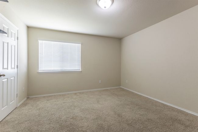 Empty room with carpet flooring and baseboards | Image 28