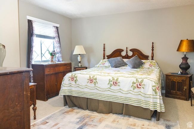 View of carpeted bedroom | Image 12