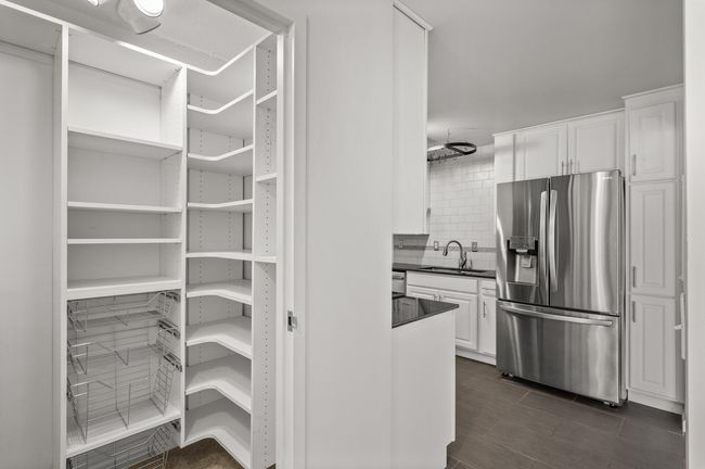 Hard to find walk-in pantry in a condo! | Image 7