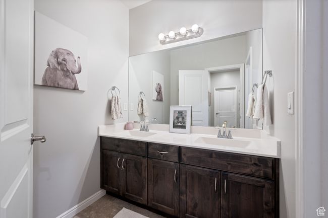 Bathroom featuring double vanity | Image 25