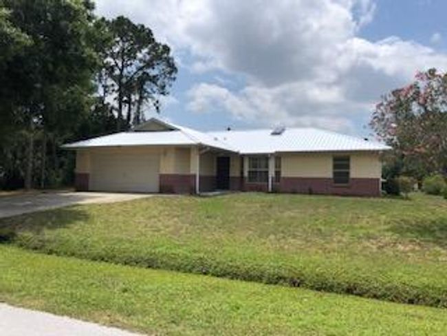 872 New Zealand Avenue Nw, House other with 3 bedrooms, 2 bathrooms and null parking in Palm Bay FL | Image 2