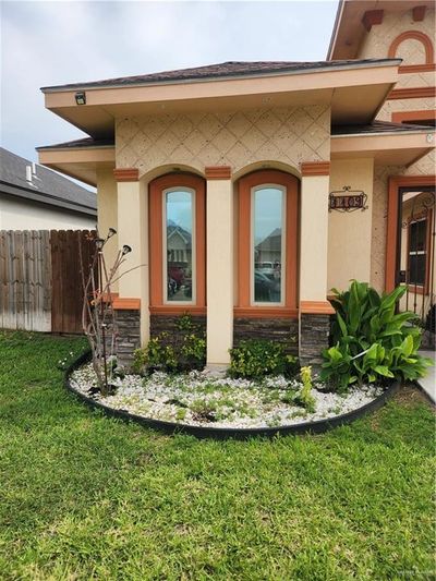 View of exterior entry featuring a yard | Image 2