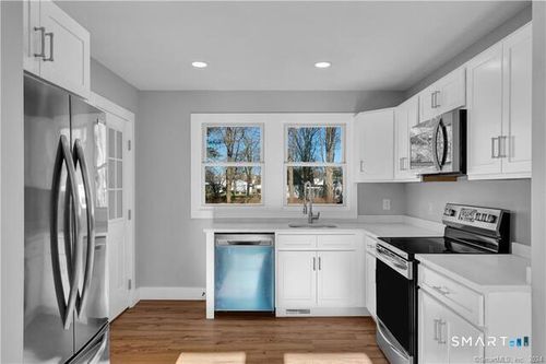 77 E Broad St, Plainville, CT, 06062-2345 | Card Image