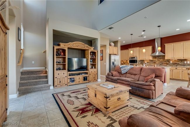 Living room featuring recessed lighting, baseboards, stairway, and visible vents | Image 31