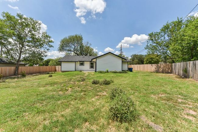 Back of house featuring a fenced backyard | Image 32