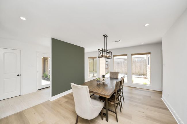 View of dinning area with view of secondary courtyard | Image 25