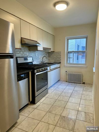 40 Glenwood Avenue, Condo with 0 bedrooms, 1 bathrooms and null parking in Jersey City NJ | Image 2