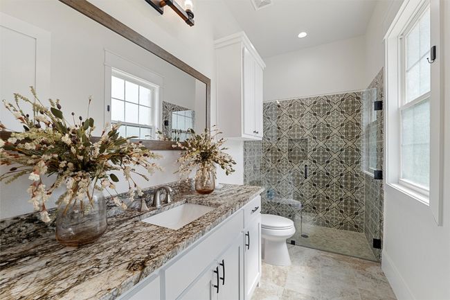 Bathroom with vanity, toilet, recessed lighting, and a shower stall | Image 8