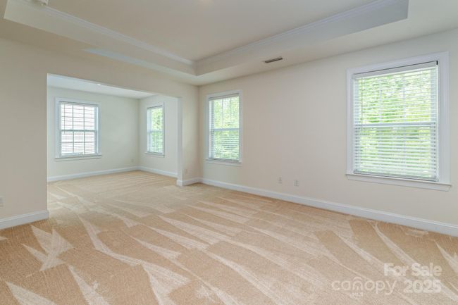 Primary bedroom with sitting area | Image 8