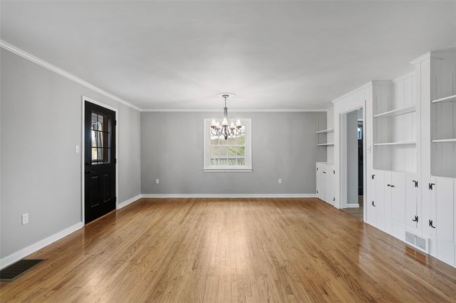 The wall of built-ins is not only functional, but keeps with the farmhouse style of the home. | Image 20